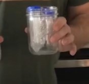 centrifuge tube in glass jar